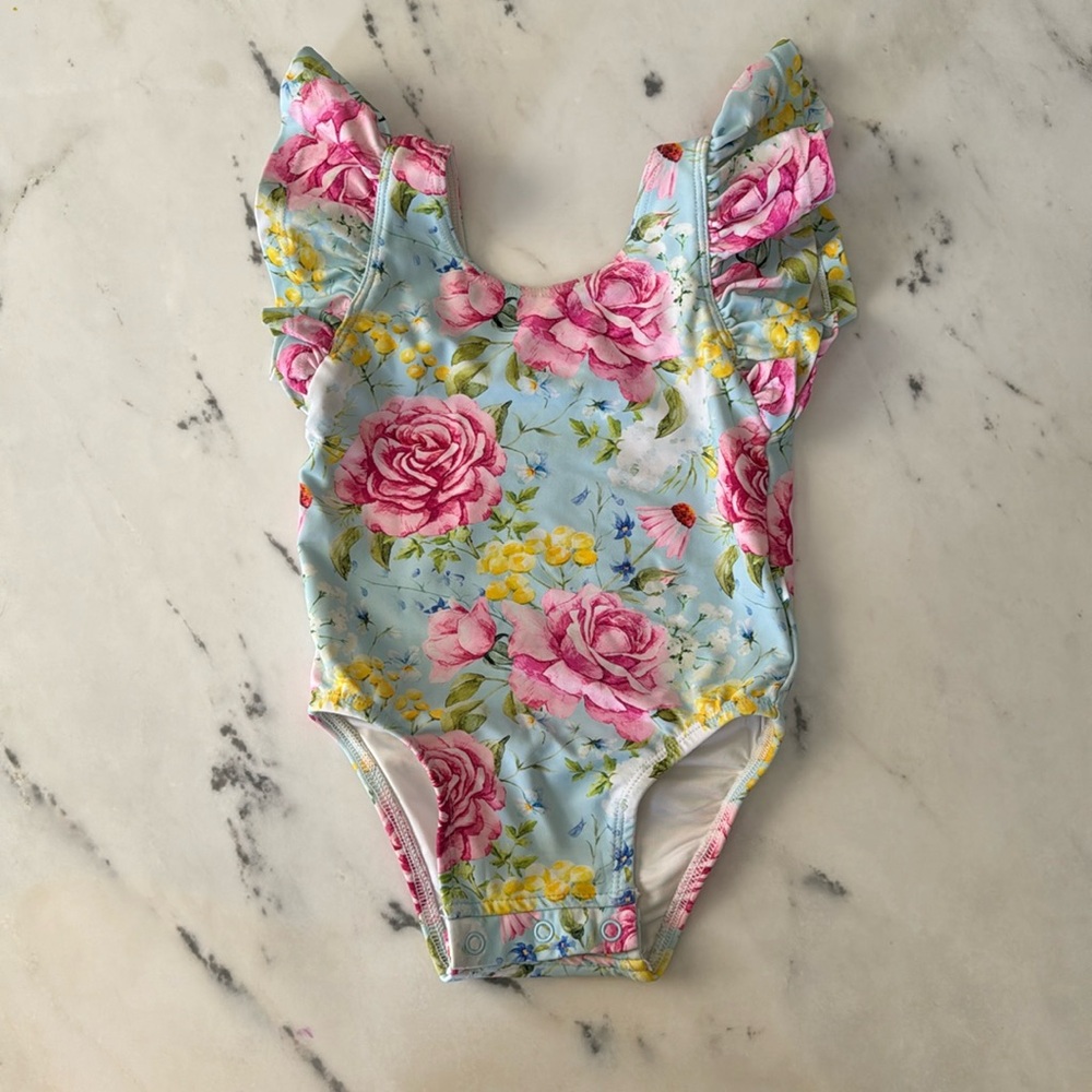 Posh Peanut baby swimsuit in floral print